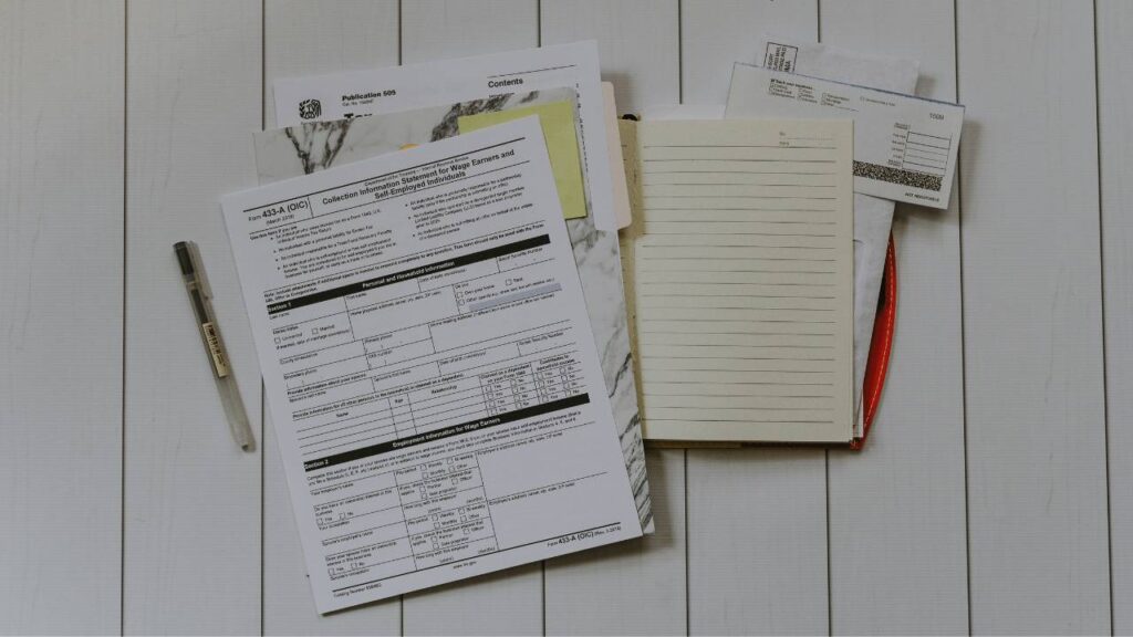 A photo of important legal documents placed on a white table