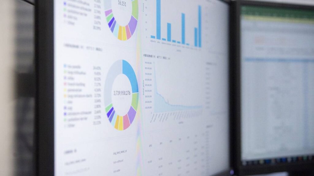 Several colourful charts shown on a display of a computer