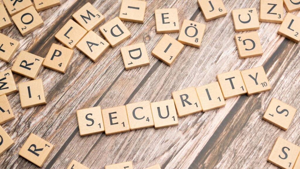 Several wooden squares forming the word "security" 